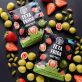 Choco-Früchte Ganze Erdbeeren in weißer Schokolade mit Pistazien